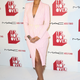 Illustration for article titled Only Rihanna Could Pull Off a Pink Gingham Power Suit